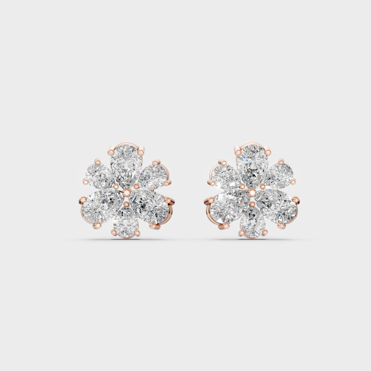 Top-down view displaying the Brilliant Sparkle of 2.30ct Pear Cut Lab-Grown Diamond Studs in 9K Rose Gold.