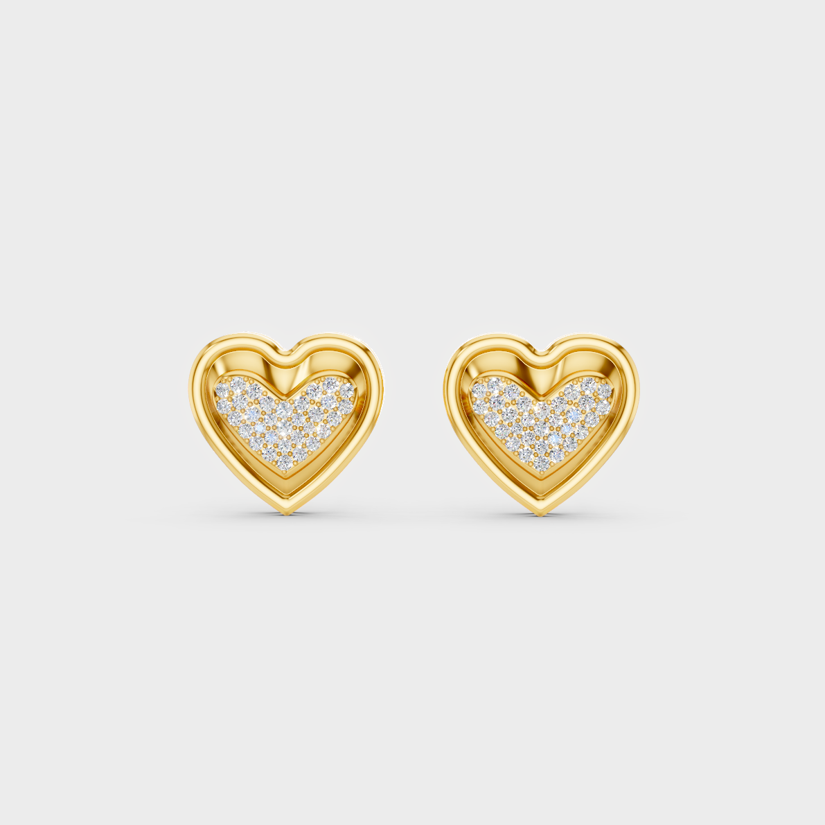 On-model ear wearing a pair of 0.50ct Round Lab-Grown Diamond Heart Studs in classic 9K Yellow Gold.