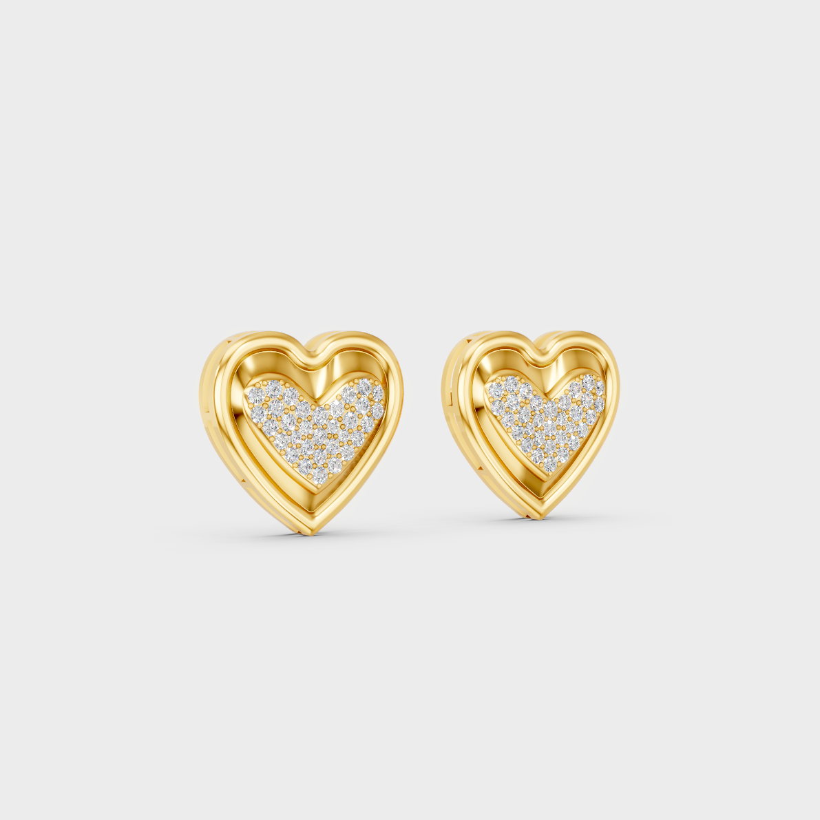 Macro studio lighting catching the fire of Sustainable Heart Shape Lab Diamond Stud Earrings in 18K Yellow Gold.