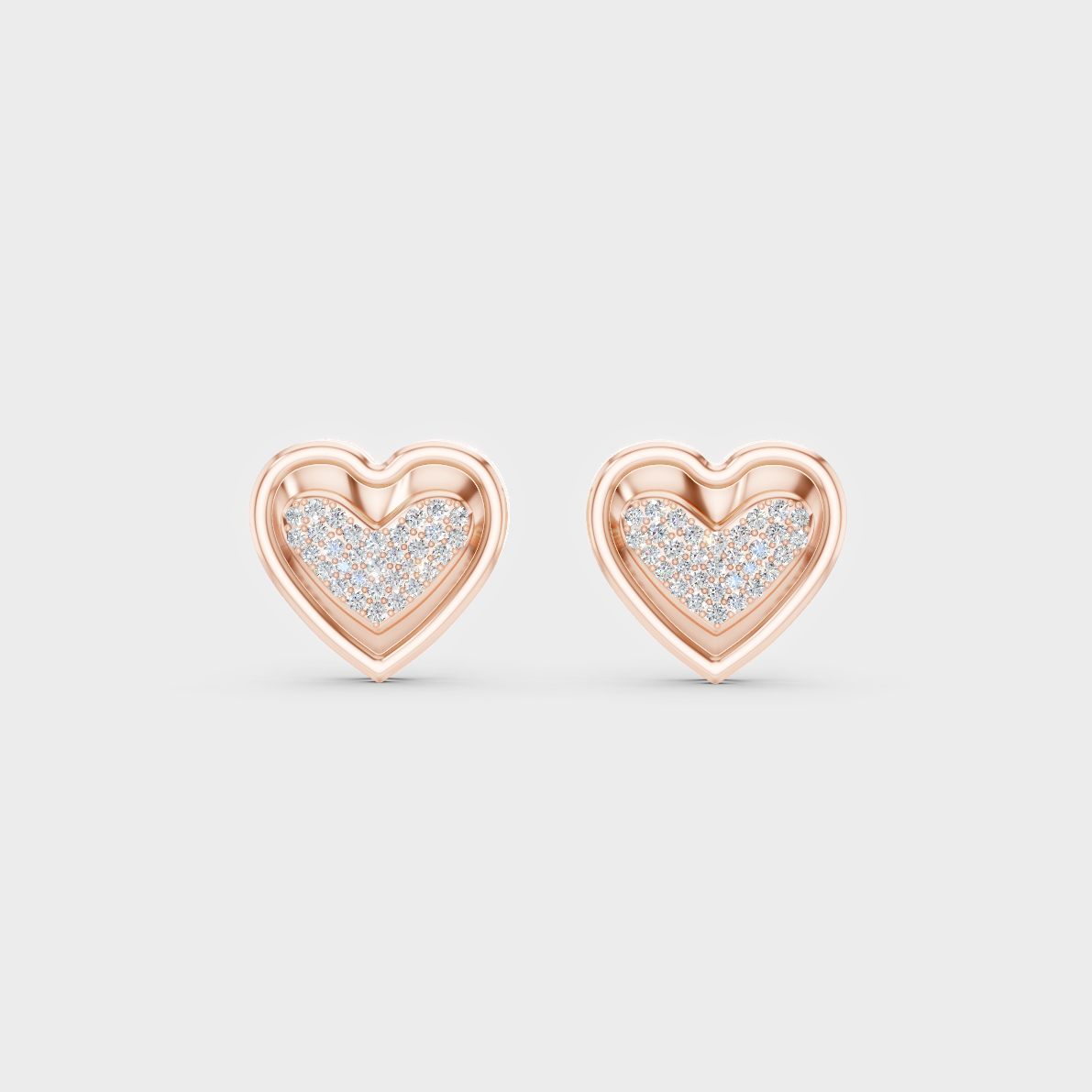 Top-down view displaying the Brilliant Sparkle of 0.50ct Heart Shape Lab-Grown Diamond Studs in 9K Rose Gold.