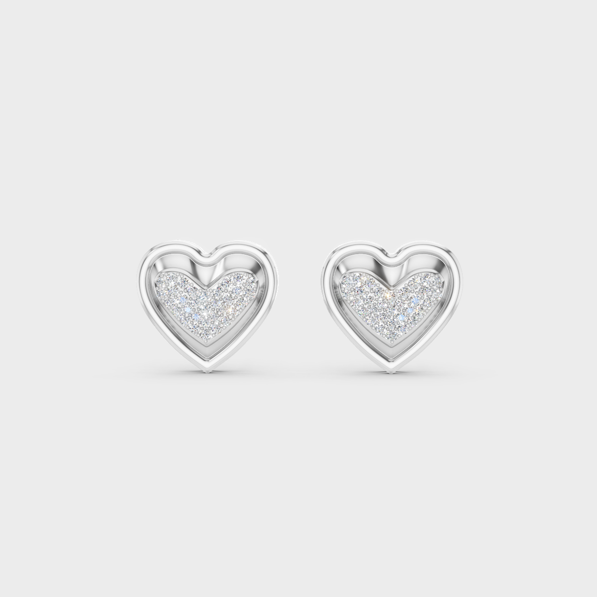On-ear perspective highlighting the icy Brilliant Sparkle of 0.50ct White Gold Heart Diamond Studs.