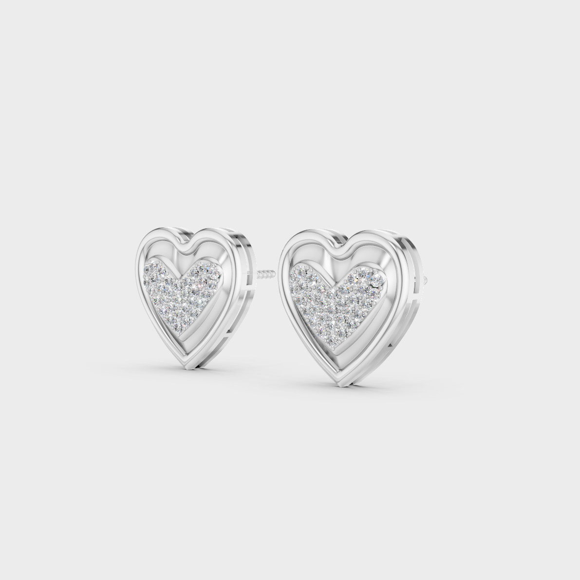 Precise prong placement securing brilliant stones on 950 Platinum Heart Shape Lab Diamond Stud Earrings.