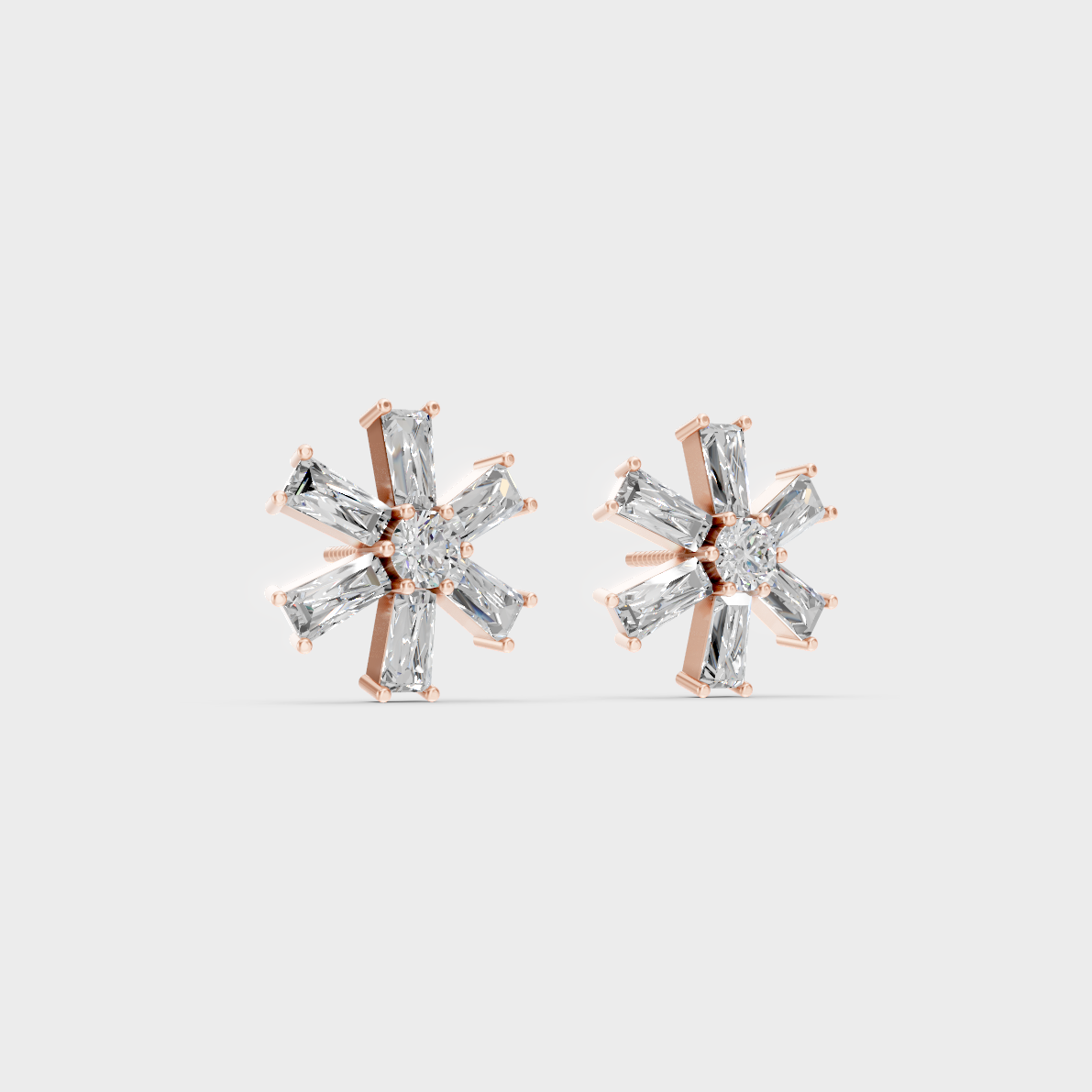 Warm light refracting through Baguette Round Sustainable Diamond Stud Earrings in 18K Rose Gold.