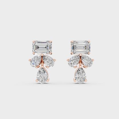 Top-down view displaying the Brilliant Sparkle of 2.06ct Emerald and Pear Diamond Studs in 9K Rose Gold.