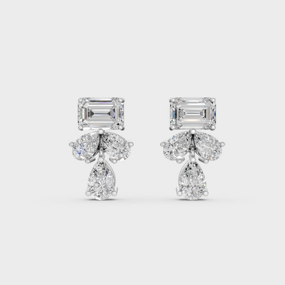 On-ear perspective highlighting the icy Brilliant Sparkle of 2.06ct White Gold Emerald Pear Diamond Studs.