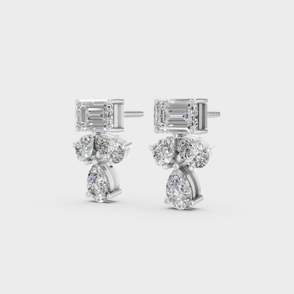 Frontal view of Ethical Luxury Studs featuring Emerald and Pear Cut Lab Diamonds set in 14K White Gold.