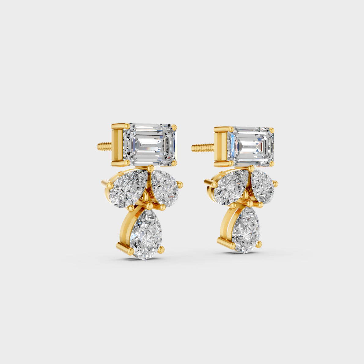 Macro studio lighting catching the fire of Sustainable Mixed Cut Lab Diamond Stud Earrings in 18K Yellow Gold.