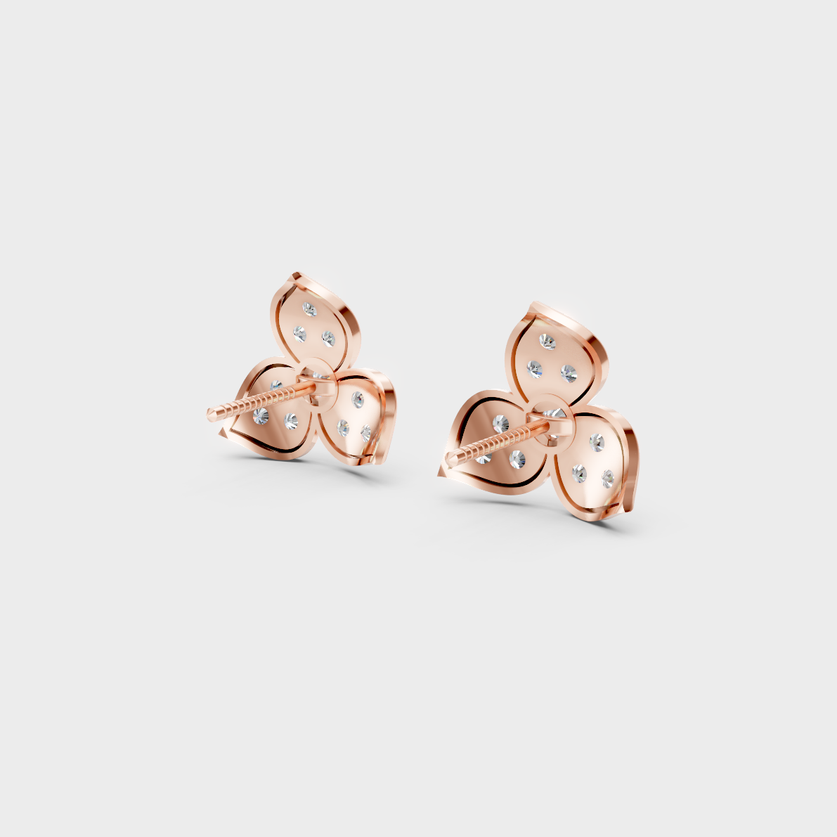 Premium jewelry box opening to reveal 0.66ct Round Lab-Grown Diamond Studs in 14K Rose Gold.