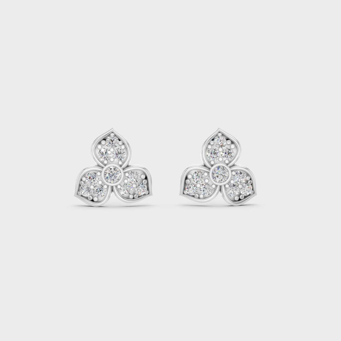 On-ear perspective highlighting the icy Brilliant Sparkle of 0.66ct White Gold Round Diamond Studs.