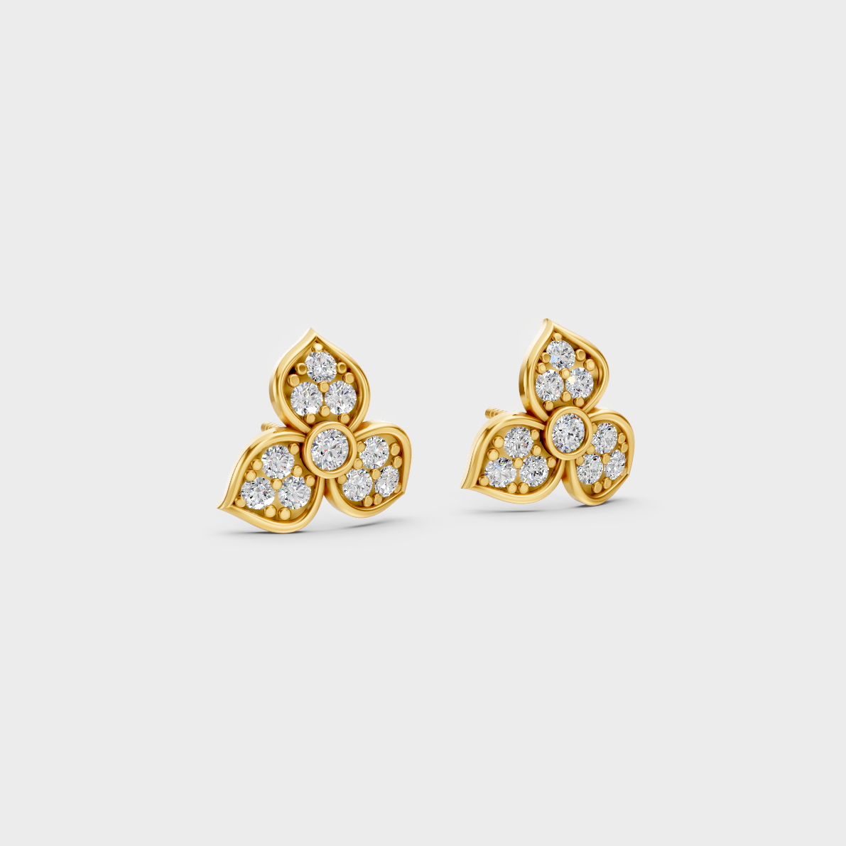 Macro studio lighting catching the fire of Sustainable Round Lab Diamond Stud Earrings in 18K Yellow Gold.