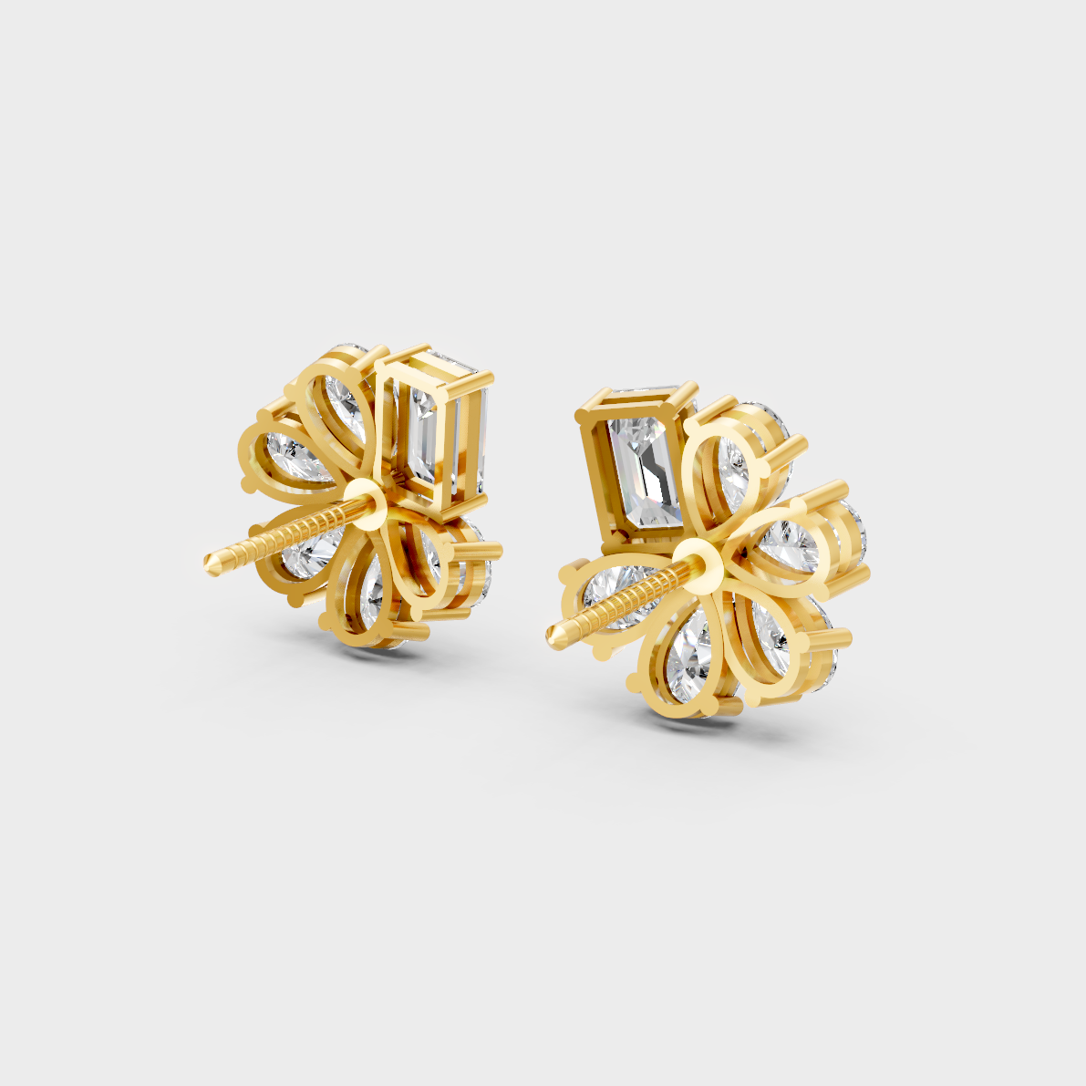 High-polish 14K Yellow Gold Setting supporting elegant Emerald and Pear Cut Lab-Grown Diamond Studs.