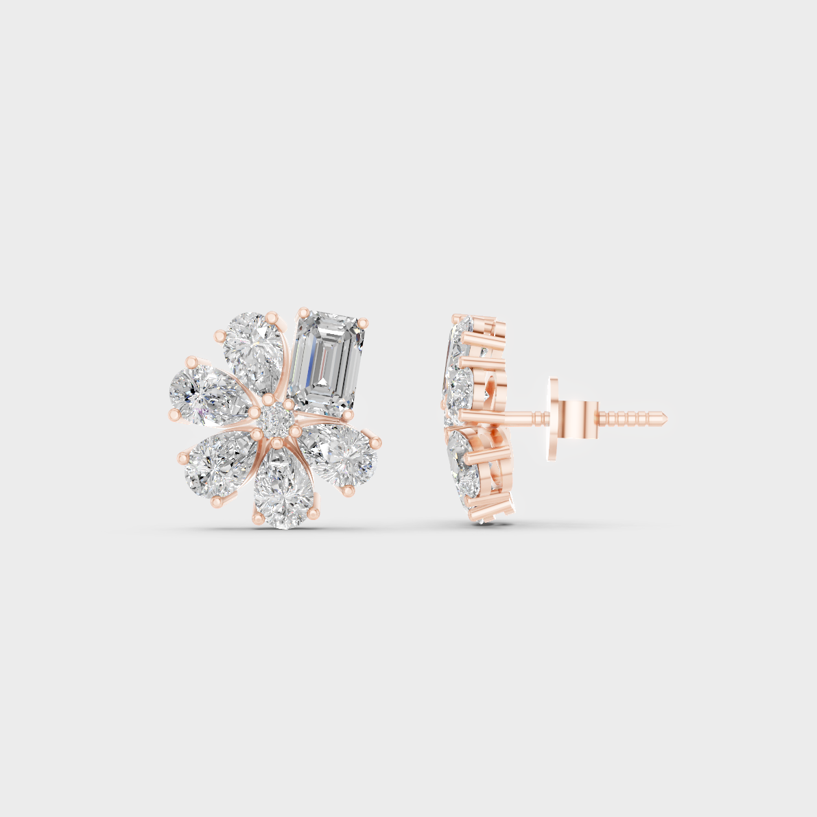 Romantic profile of 2.46 Carat Emerald and Pear Cut Lab-Grown Diamond Stud Earrings in blush 14K Rose Gold.