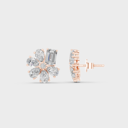 Romantic profile of 2.46 Carat Emerald and Pear Cut Lab-Grown Diamond Stud Earrings in blush 14K Rose Gold.