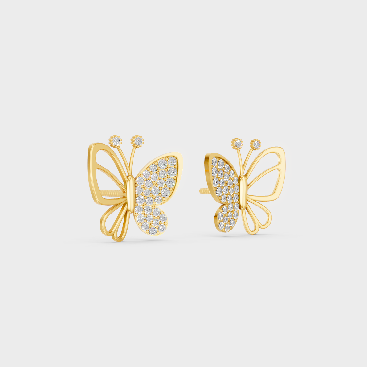 Macro studio lighting catching the fire of Sustainable Butterfly Shape Lab Diamond Stud Earrings in 18K Yellow Gold.