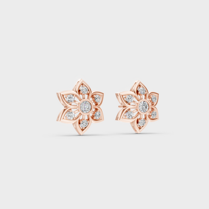 Warm light refracting through Round Cut Sustainable Diamond Stud Earrings in 18K Rose Gold.