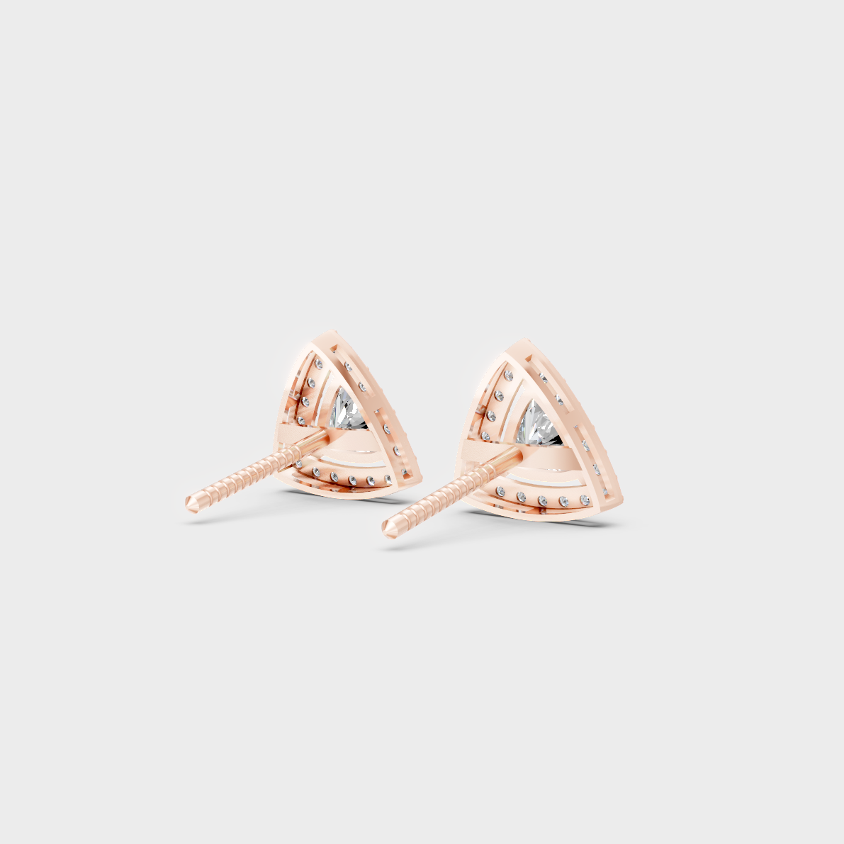 Premium jewelry box opening to reveal 2.05ct Trillion and Round Lab-Grown Diamond Halo Studs in 14K Rose Gold.