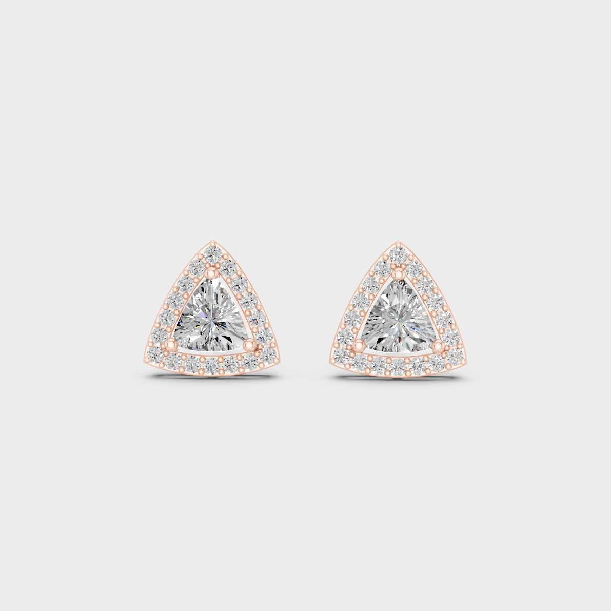 Top-down view displaying the Brilliant Sparkle of 2.05ct Trillion and Round Diamond Halo Studs in 9K Rose Gold.