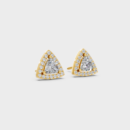 Macro studio lighting catching the fire of Sustainable Trillion Cut Lab Diamond Halo Earrings in 18K Yellow Gold.