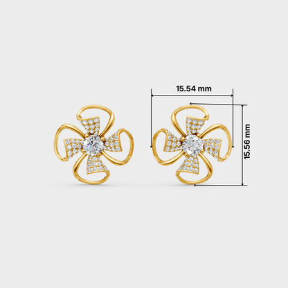A pair of gold flower-shaped stud earrings with pavé-set clear stones and a central round stone, shown on a light gray background with dimension lines and measurements 15.54 mm and 15.