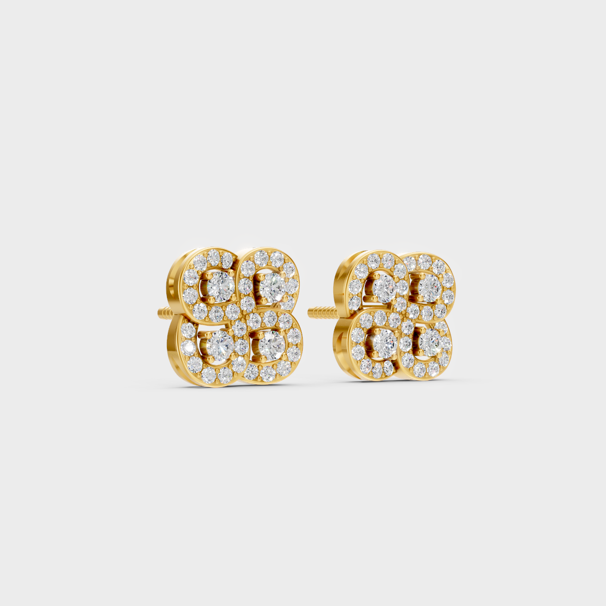 Macro studio lighting catching the fire of Sustainable Round Lab Diamond Stud Earrings in 18K Yellow Gold.