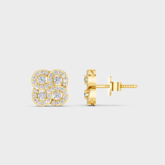 Close-up shot of 0.56 Carat Round Cut Lab-Grown Diamond Stud Earrings set in warm 14K Yellow Gold.