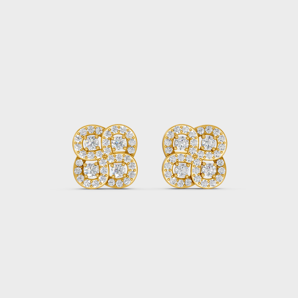On-model ear wearing a pair of 0.56ct Round Lab-Grown Diamond Studs in classic 9K Yellow Gold.