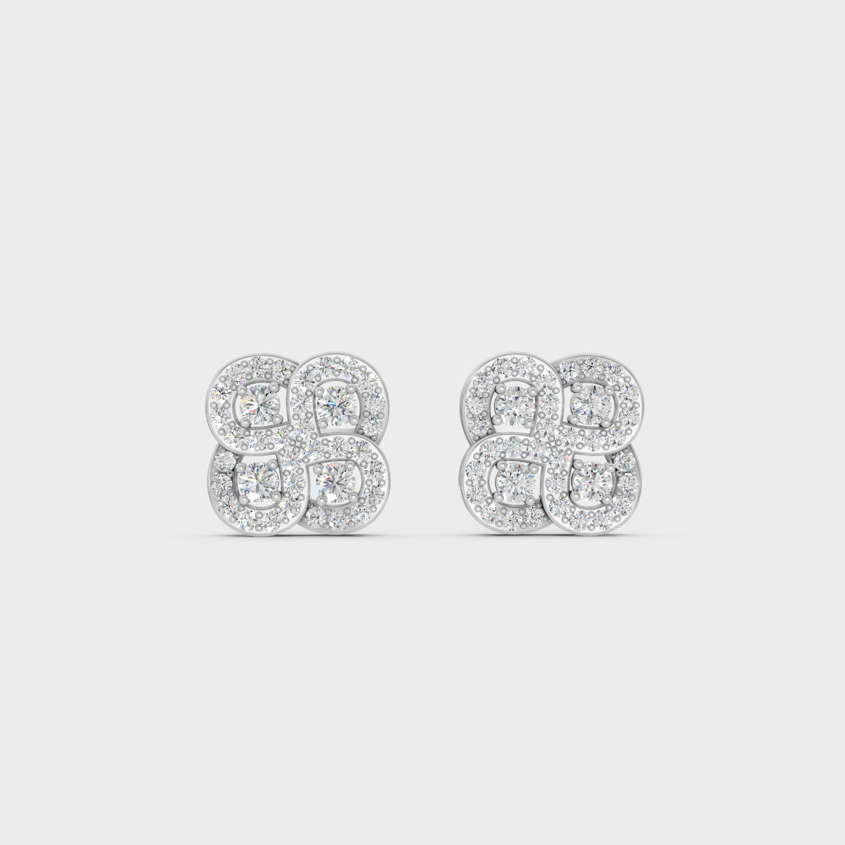 On-ear perspective highlighting the icy Brilliant Sparkle of 0.56ct White Gold Round Diamond Studs.