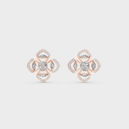 Warm light refracting through Round Marquise Sustainable Diamond Stud Earrings in 18K Rose Gold.