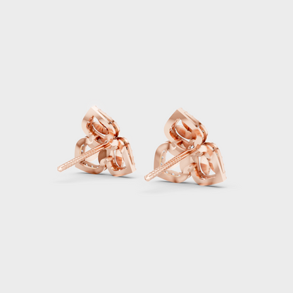 Premium jewelry box opening to reveal 0.56ct Round Lab-Grown Diamond Studs in 14K Rose Gold.