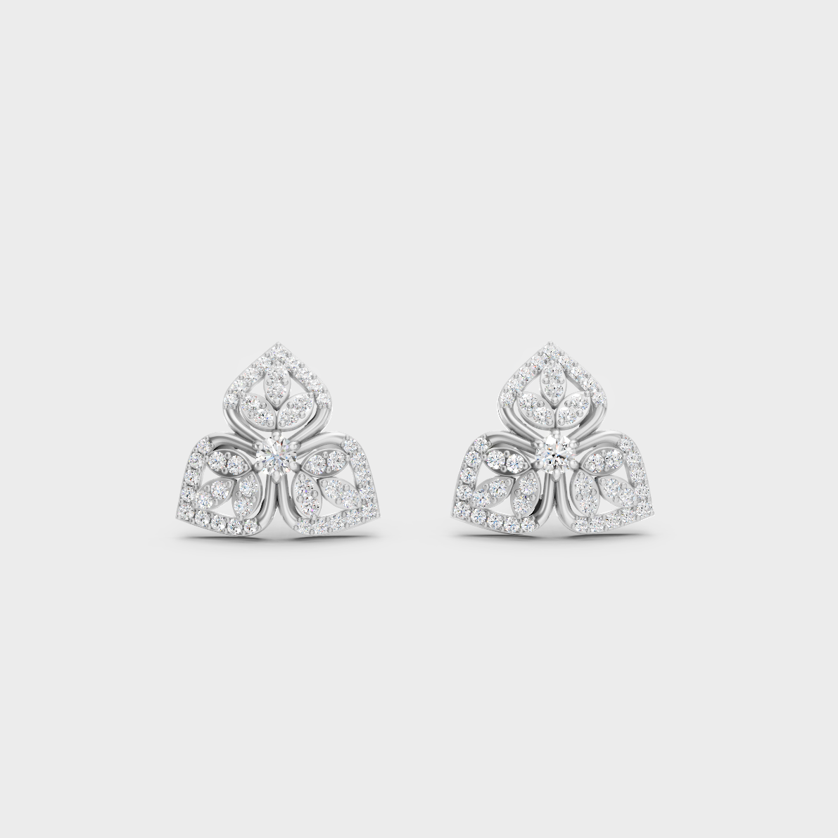 On-ear perspective highlighting the icy Brilliant Sparkle of 0.56ct White Gold Round Diamond Studs.