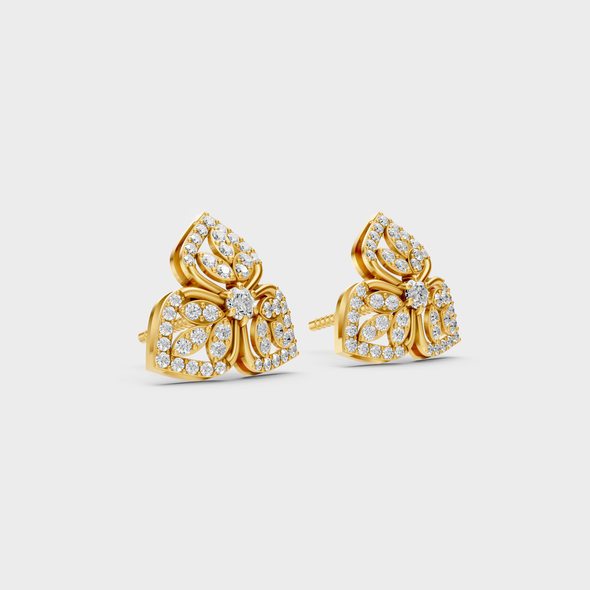 Macro studio lighting catching the fire of Sustainable Round Lab Diamond Stud Earrings in 18K Yellow Gold.