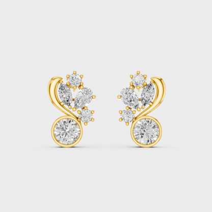 On-model ear wearing a pair of 1.4ct Round, Pear, and Marquise Lab Diamond Stud Earrings in classic 9K Yellow Gold.