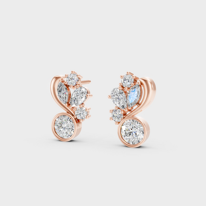 Pair of Ethical Luxury Multi-Shape Lab Diamond Studs glowing on a rose-hued 18K Rose Gold Setting.