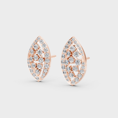 Pair of Ethical Luxury Diamond Solitaire Studs glowing on a rose-hued 18K Rose Gold Setting.