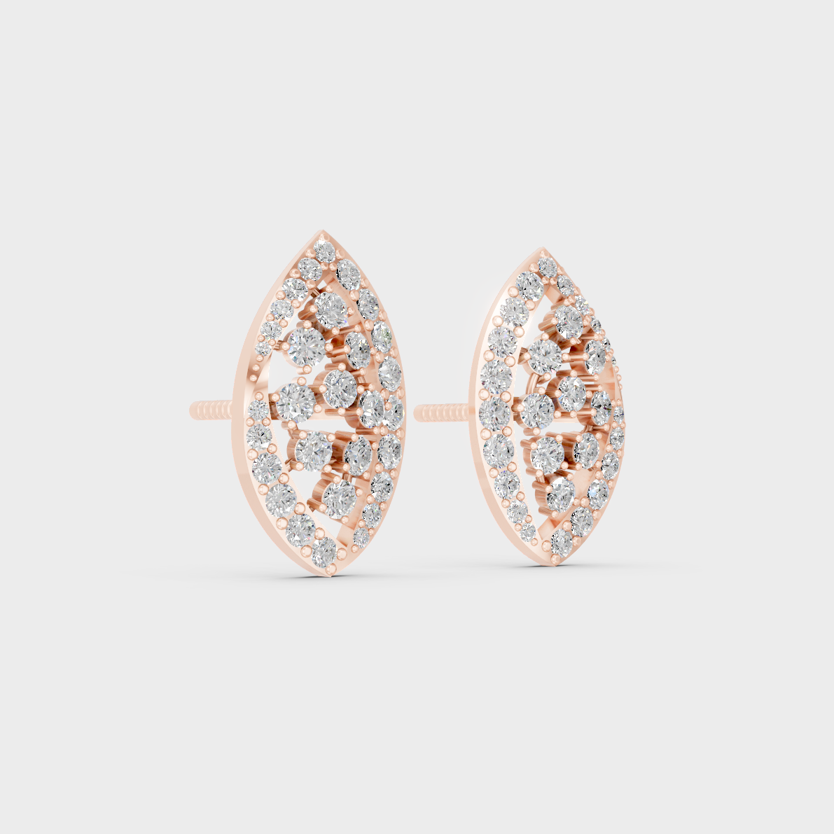 Warm light refracting through Round Cut Sustainable Diamond Stud Earrings in 18K Rose Gold.