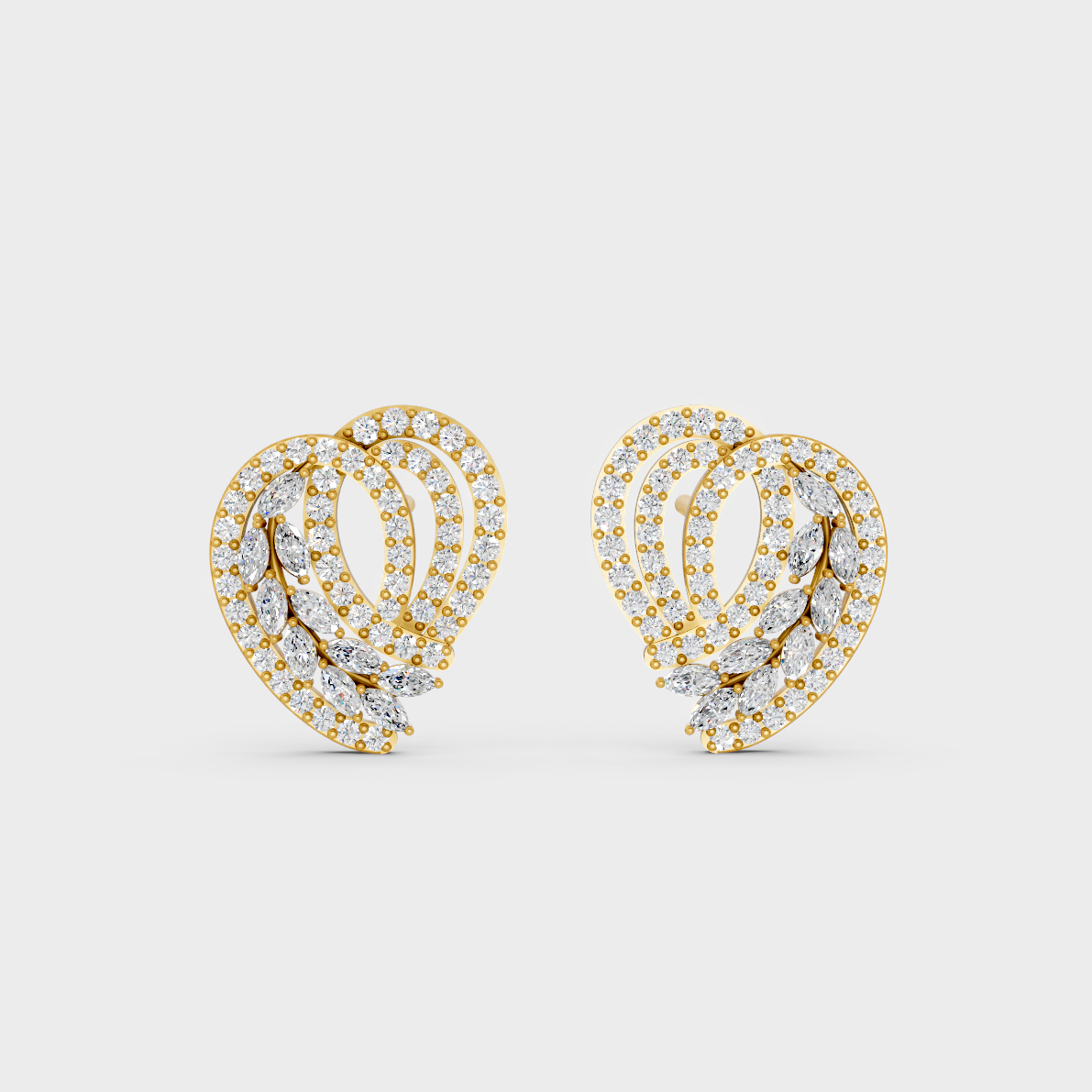 On-model ear wearing a pair of 0.68ct Round and Marquise Lab Diamond Stud Earrings in classic 9K Yellow Gold.