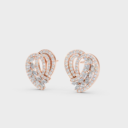 Pair of Ethical Luxury Round and Marquise Diamond Studs glowing on a rose-hued 18K Rose Gold Setting.