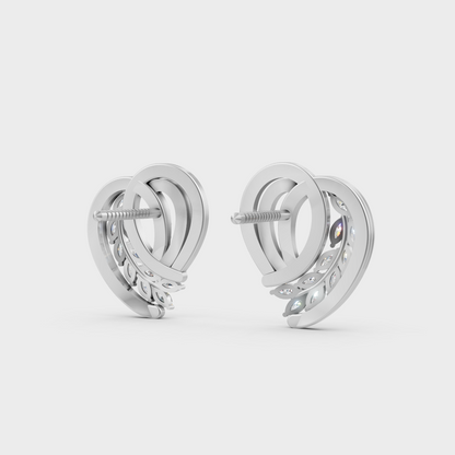 Contemporary style display of 0.68 Carat Sustainable Diamond Stud Earrings in radiant 18K White Gold.