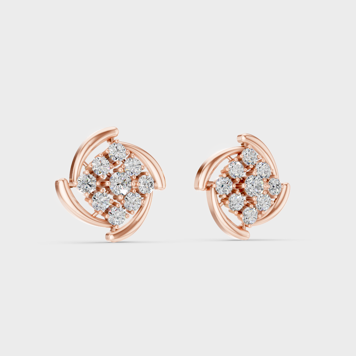 Warm light refracting through Round Cut Sustainable Diamond Stud Earrings in 18K Rose Gold.