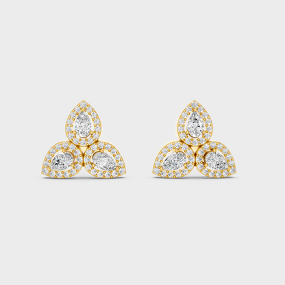 On-model ear wearing a pair of 0.96ct Round and Pear Lab Diamond Stud Earrings in classic 9K Yellow Gold.