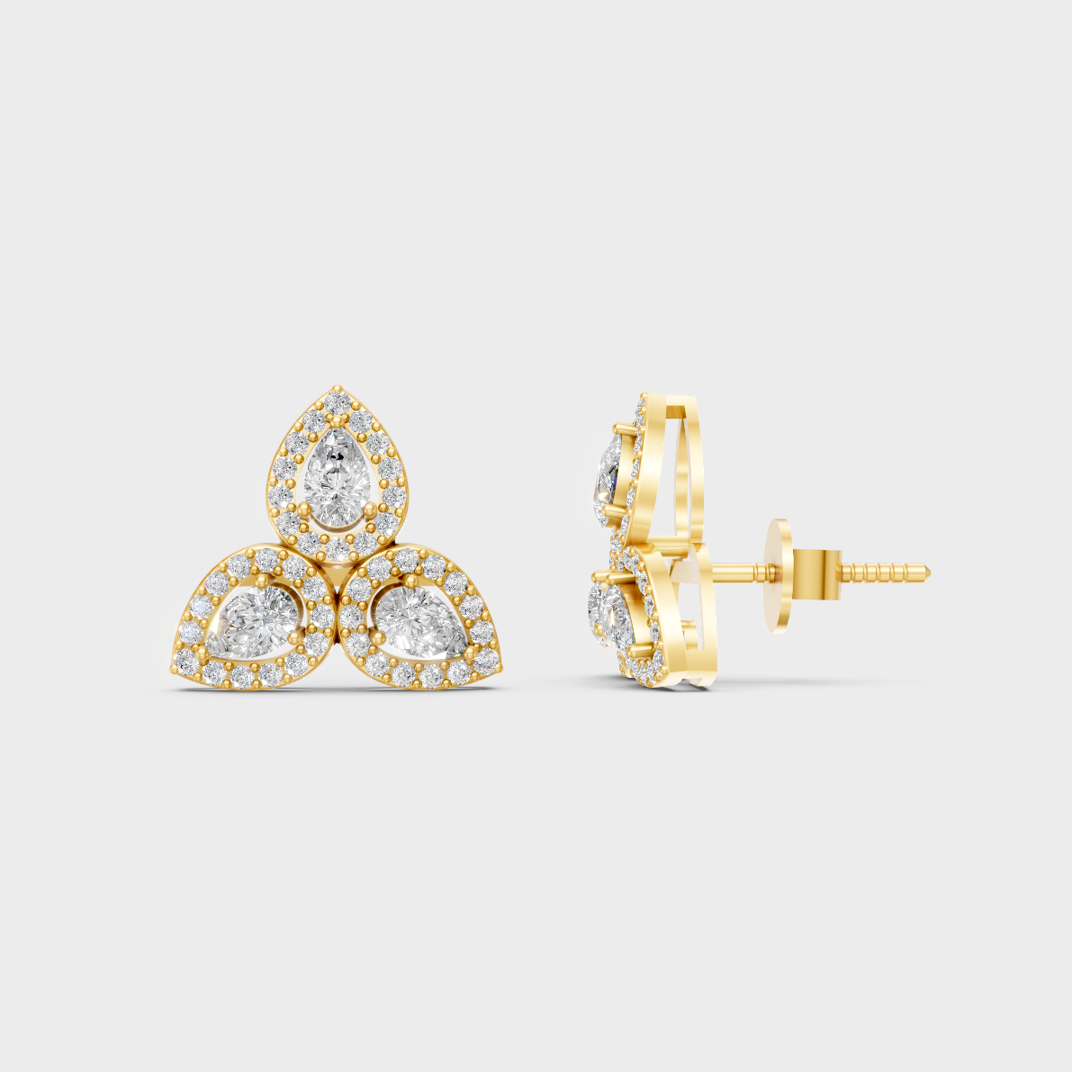 Close-up shot of 0.96 Carat Round and Pear Cut Lab-Grown Diamond Stud Earrings set in warm 14K Yellow Gold.