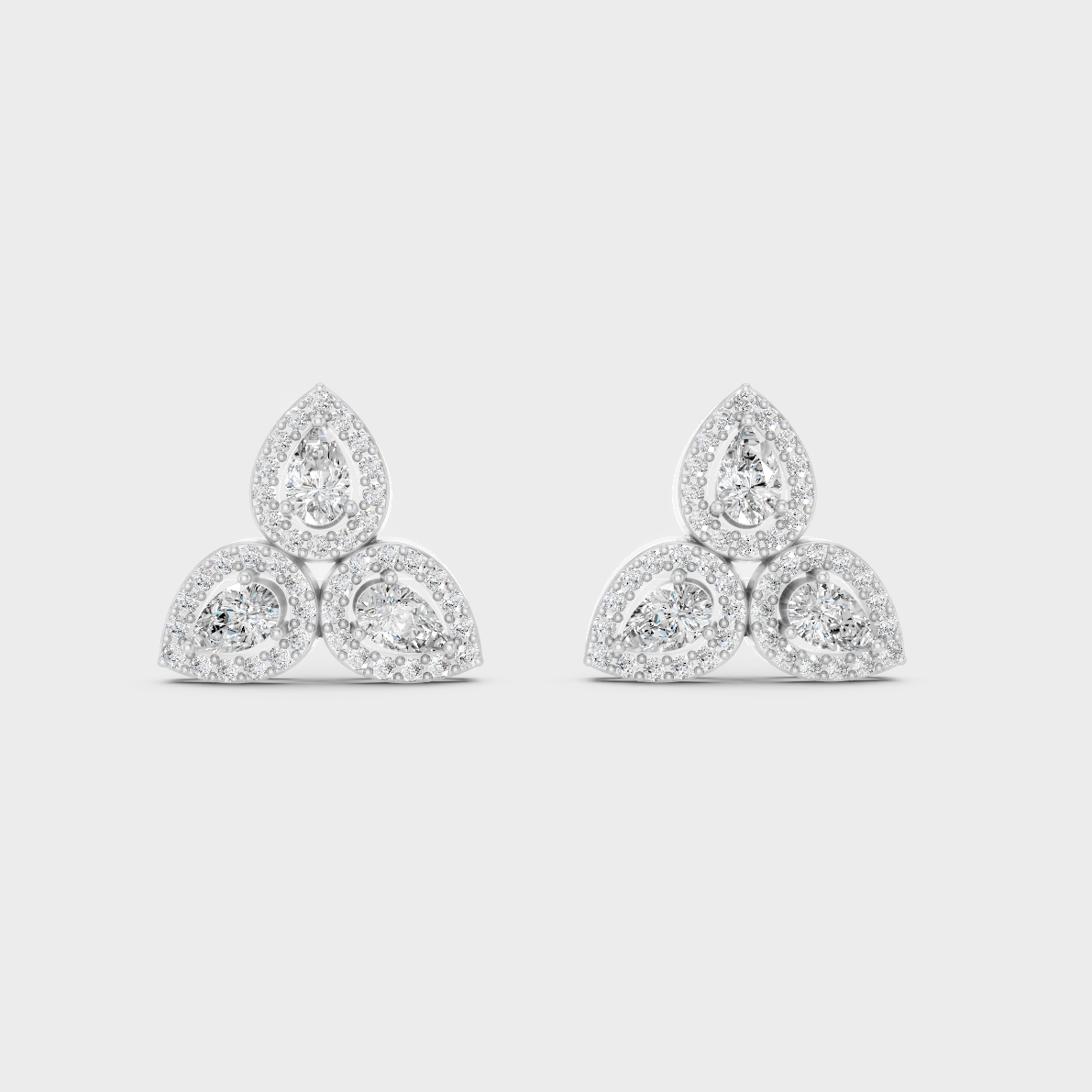On-ear perspective highlighting the icy Brilliant Sparkle of 0.96ct White Gold Round Pear Diamond Studs.