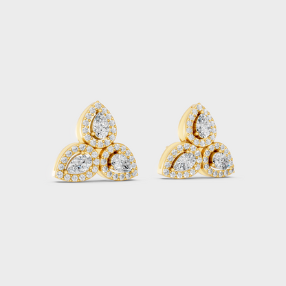 Macro studio lighting catching the fire of Sustainable Mixed Cut Lab Diamond Stud Earrings in 18K Yellow Gold.