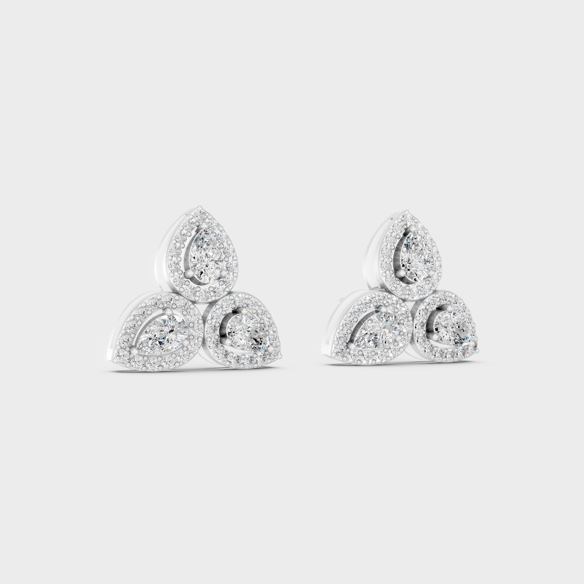 Precise prong placement securing brilliant stones on 950 Platinum Round and Pear Lab Diamond Stud Earrings.