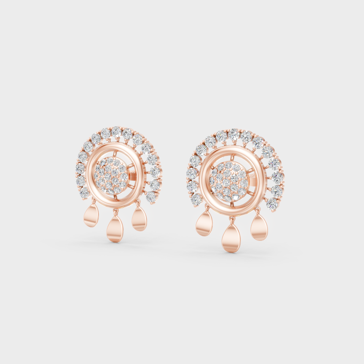 Pair of Ethical Luxury Diamond Solitaire Studs glowing on a rose-hued 18K Rose Gold Setting.