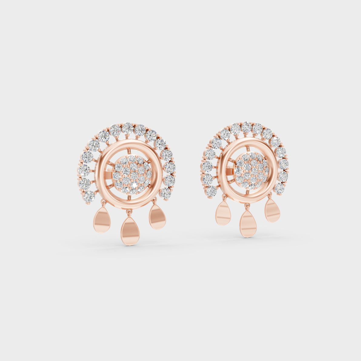 Warm light refracting through Round Cut Sustainable Diamond Stud Earrings in 18K Rose Gold.