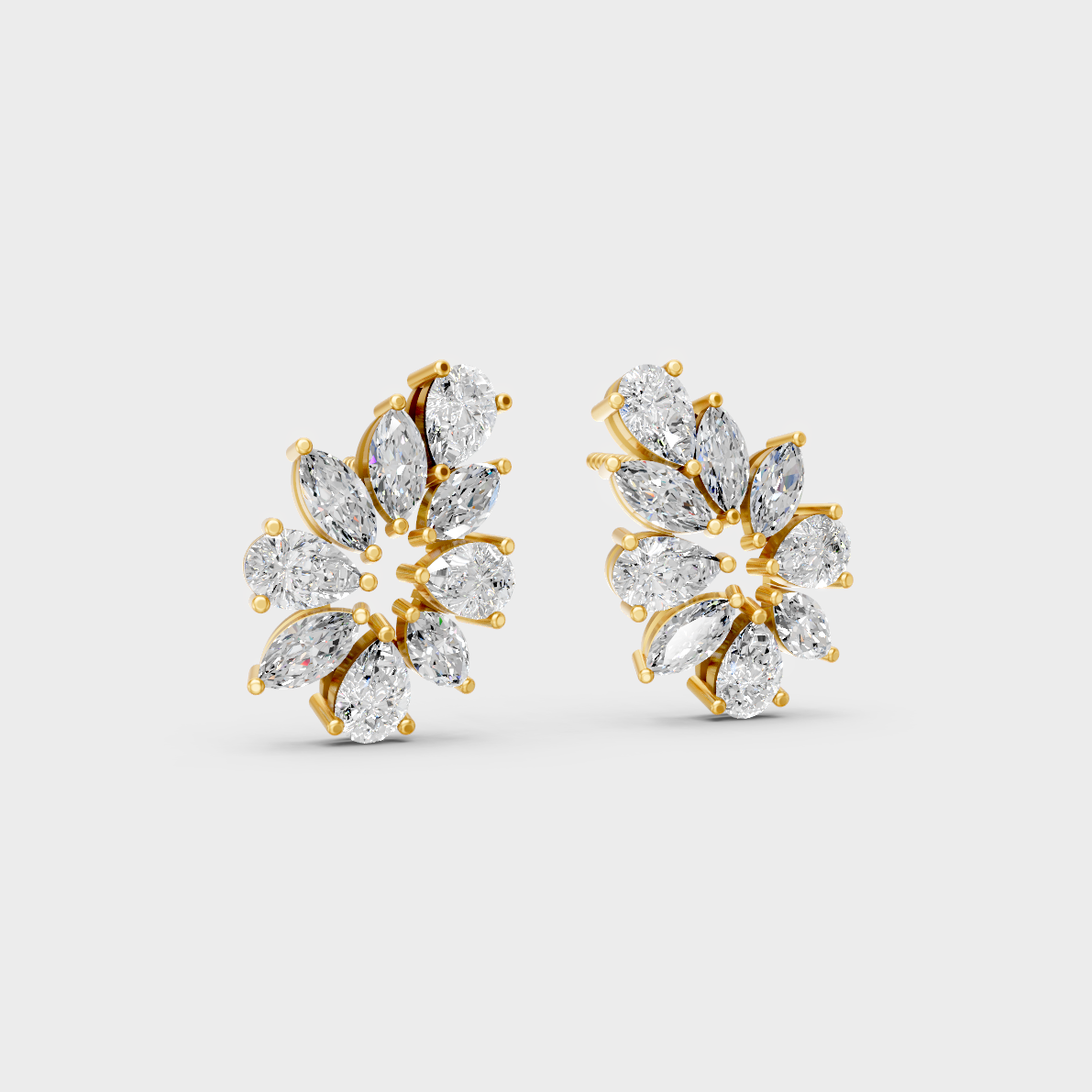 Macro studio lighting catching the fire of Sustainable Mixed Cut Lab Diamond Stud Earrings in 18K Yellow Gold.