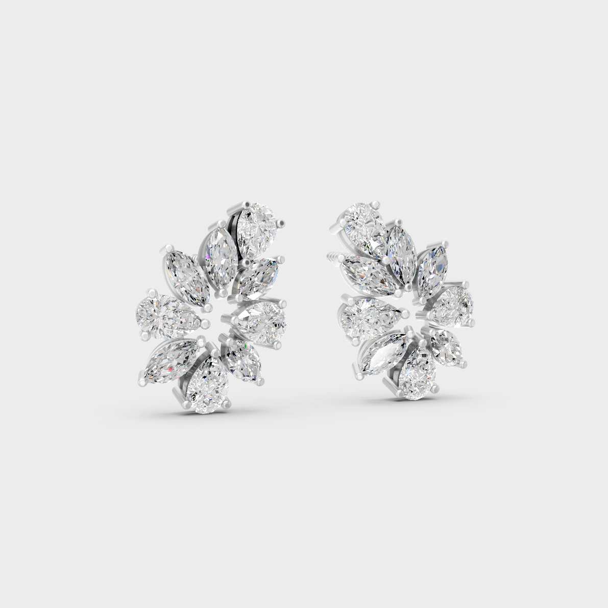 Precise prong placement securing brilliant stones on 950 Platinum Marquise and Pear Lab Diamond Stud Earrings.