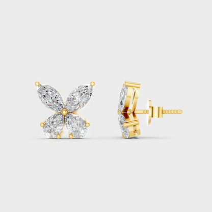 Close-up shot of 1.74 Carat Marquise and Pear Cut Lab-Grown Diamond Stud Earrings set in warm 14K Yellow Gold.