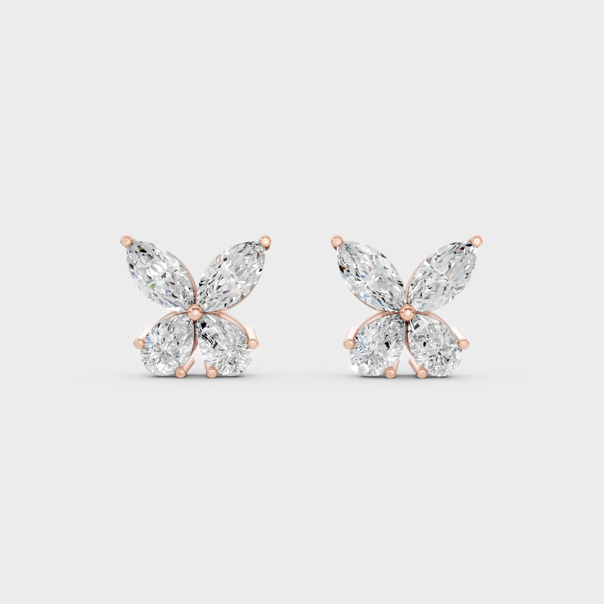 Top-down view displaying the Brilliant Sparkle of 1.74ct Marquise and Pear Diamond Studs in 9K Rose Gold.